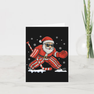 Cartão Natal jogando goleiro de hóquei no gelo Natal