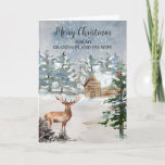 Cartão Natal Rustic Deer Grandson e Esposa<br><div class="desc">Feliz Natal para o neto e a esposa num cartão de direito com uma neve rústica cobriu cabana na floresta e um verso pensativo.</div>