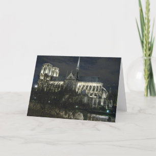 Cartão Notre Dame na noite
