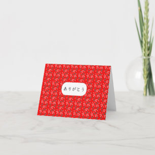 Cartão Obrigado em japonês com o fundo vermelho Arigatou