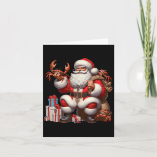 Cartão Papai Noel Americano segurando caranguejo presente