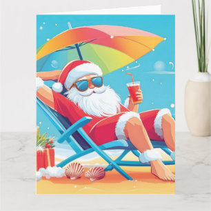 Cartão Papai Noel Relaxando em uma Cama de Sol de Praia T