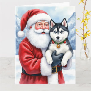 Cartão Papai Noel segurando a arte de Natal do Husky Sibe