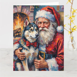 Cartão Papai Noel segurando a arte de Natal do Husky Sibe