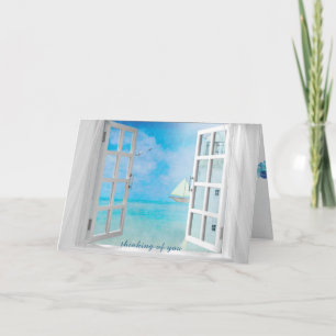 Cartão pensando na janela aberta com farol branco