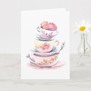 Cartão Pilha de xícara de chá em pastel com flores feliz