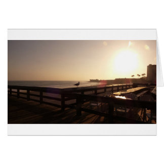Cartão Por do sol no cais