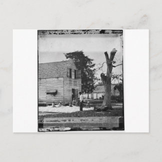 Cartão Postal Afro-americanos preparando algodão cerca de 1862