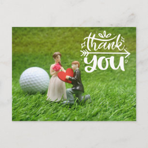 Cartão Postal Bola de golfe e tee estão na grama verde Casamento