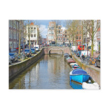 Canal de Amesterdã com barcos