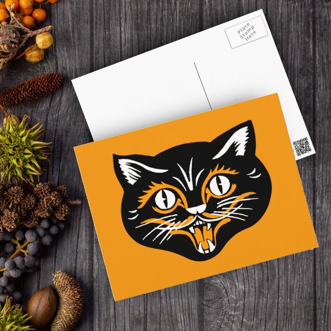 Cartão Postal Cara do gato do vintage do Dia das Bruxas (Happy smiling Halloween black cat face with white accents on orange postcard.)