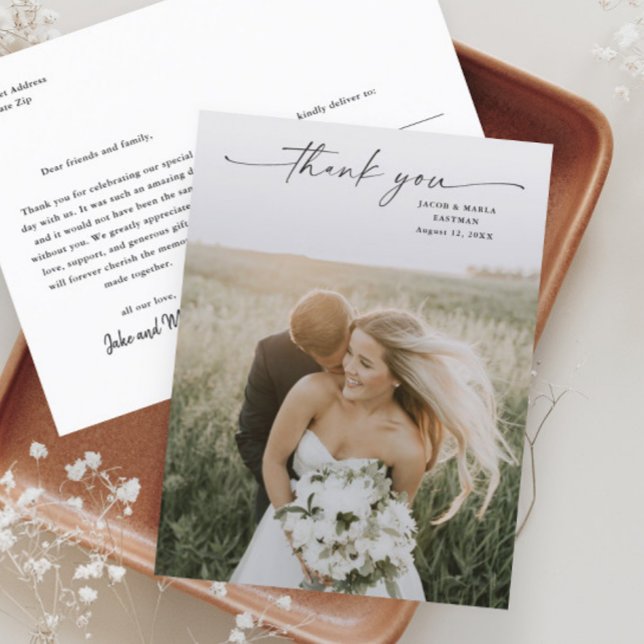 Cartão Postal Casamento de Foto de Script Elegante Obrigado (Elegant Script Photo Wedding Thank You Postcard with modern handwritten script typographic overlay.)