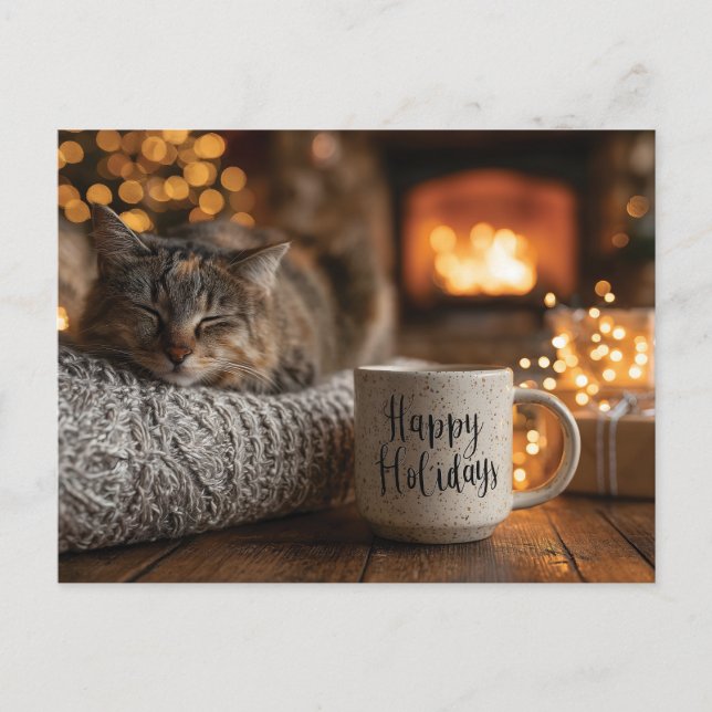 Cartão Postal Cat Sleeping Next to a 'Happy Holidays" Mug (Frente)