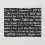 Cartão Postal Christmas Greetings Multiple Languages Chalkboard<br><div class="desc">Christmas greetings in various languages on black background.</div>