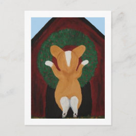 Cartão Postal Corgi colocando Coroa de Natal na Casa do Cachorro