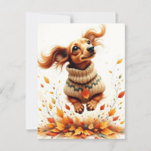 Cartão Postal Dachshund brincando nas folhas do outono