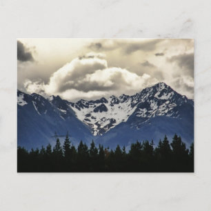 Cartão postal das Montanhas Snowy no lago Tekapo