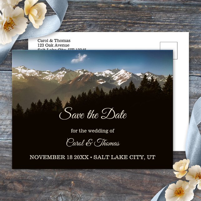 Cartão Postal De Anúncio Pine Tree Mountain Save the Date Postcard (Save the Date postcard featuring a painting of pine trees with snow capped mountains)