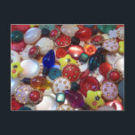 Cartão Postal De Festividades Cheery Christmas Button Collage<br><div class="desc">A button collage filled with cheery Christmas sewing buttons. A lovely assortment of Christmas colors including novelty buttons such as stars and Christmas tree light bulbs.</div>