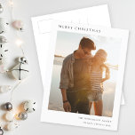 Cartão Postal De Festividades Foto Simples e Informal Moderna do Natal Minimalis<br><div class="desc">Um cartão postal de na moda mínimo com fotografia, com a tipografia clássica "Feliz Natal", a preto, sobre um fundo branco minimalista e limpo. A foto, o cartões de natal e o texto podem ser facilmente personalizados para um toque pessoal. Um design de natal simples, minimalista e contemporâneo para destacar...</div>