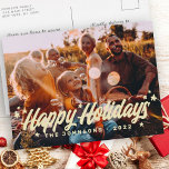 Cartão Postal De Festividades Modern Simple Playful Greetings Stars Family Photo<br><div class="desc">Design is composed of a simple playful cursive typography with stars. Add your family's name,  year,  and custom message.

Available here:
http://www.zazzle.com/store/selectpartysupplies</div>