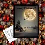 Cartão Postal De Festividades Papais noeis Vintage Sob Cartão-Postal De Lua Chei<br><div class="desc">Este é um velho cartão de Natal da década de 1960, feito de novo através da magia de Zazzle. O cartão mostra Papais noeis e sua rena debaixo de uma lua de cheio. O enorme pinheiro e solitário na cena, deixa um com um sentimento de maravilha e encantamento da época...</div>