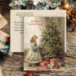 Cartão Postal De Festividades Presentes de natais vintages de Árvore<br><div class="desc">Cartaz de saudação de Natal com uma pintura vintage de uma menina decorando uma árvore de Natal com presentes embrulhados por baixo. O texto diz, "Feliz Natal" mas é personalizável para sua própria saudação. Personalizado no verso com sua mensagem, juntamente com seu nome e endereço de retorno. Entre em contato...</div>