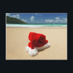 Cartão Postal De Festividades Santa's hat on a tropical beach<br><div class="desc">Tropical christmas</div>