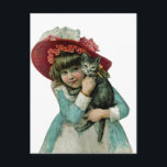 Cartão Postal De Festividades Segurando um Kitten de Natal<br><div class="desc">Victorian inspirou uma garota vestindo um grande capô rosa e segurando uma gatinha cinza.</div>