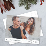 Cartão Postal De Festividades Trendy Christmas | Modern Stylish Couple Photo<br><div class="desc">A stylish holiday photo postcard with modern typography “Merry Christmas" in dark forest green and handwritten script typography for the couples name(s) on a clean simple minimalist white background. The photo, name and greeting can be easily customized for a personal touch. A simple, minimalist and contemporary christmas design to stand...</div>