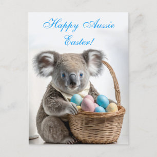 Cartão Postal De Festividades Urso coala segurando uma cesta com ovos de Páscoa