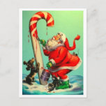Cartão Postal De Festividades Vintage Santa Claus Pintando Uma Canela De Doces<br><div class="desc">Vintage Papais noeis pintando uma ilustração de cana doce.</div>