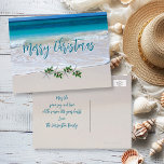 Cartão postal de Natal Tropical Ocean Beach<br><div class="desc">Saudação de Natal tropical,  cartão postal de barato. Personalize todo o texto com a areia do oceano e da praia como a imagem de fundo. Economize dinheiro com este tipo de cartão.</div>