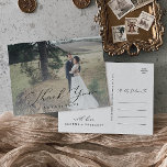 Cartão Postal Delicate Calligraphy Light Photo Overlay Thank You<br><div class="desc">This delicate calligraphy light photo overlay thank you postcard is perfect for a modern wedding. The romantic minimalist design features lovely and elegant black typography on a photo background with a clean and simple look. Personalize the back of the postcard with your names, your return address, and a thank you...</div>