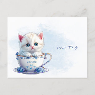 Cartão postal do gatinho em xícara com flores azui