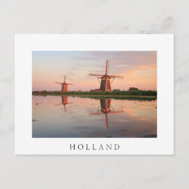 Cartão Postal Dois moinhos de vento com reflexo no pôr do sol