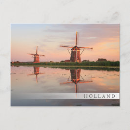 Cartão Postal Dois moinhos de vento com reflexo no pôr do sol