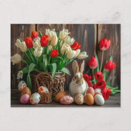Cartão Postal Easter bunny seated beside colorful eggs and tulip