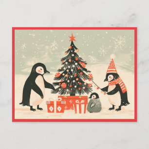 Cartão Postal Família de Pinguins Decorando a Árvore de Natal