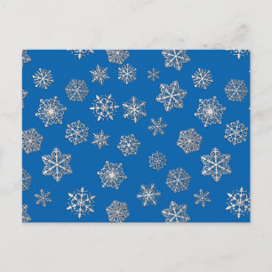 Cartão Postal Flocos de neve prateados sobre fundo azul de cobal
