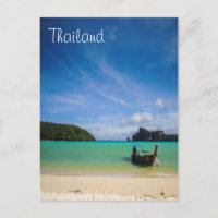 Foto da praia de Tailândia com barco de pesca