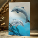 Cartão Postal Golfinhos de Aquarela<br><div class="desc">Este design pode ser personalizado na área fornecida pela alteração da foto e/ou do texto. Ou pode ser personalizado clicando em Personalizar este Modelo e, em seguida, escolhendo o clique para personalizar mais a opção e excluir ou alterar a cor do plano de fundo, adicionar texto, alterar a cor ou...</div>