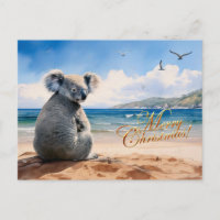 Koala em uma praia arenosa Feliz Natal