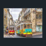 Cartão Postal Linha de elétrico portuguesa<br><div class="desc">A Linha Tram Portuguesa é uma fotografia pitoresca de dois elétricos coloridos que atravessam as antigas ruas de Portugal.</div>