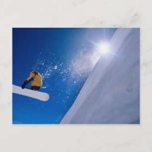 Cartão Postal Man flying through the air on a snowboard with