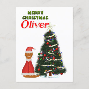 Cartão Postal Oliver vestido de Papai Noel ao lado de sua árvore