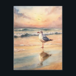 Cartão Postal Pintor de Aquarelas do Mar de Seagull Shore Sunset<br><div class="desc">Envie um fôlego de ar oceânico com este cartão postal de gaivota tranquilo, com uma belíssima cor d'água pintada à mão de uma gaivota que fica na costa ao pôr do sol. Com tons quentes, ondas suaves e reflexões suaves, este cartão-postal evoca momentos pacíficos de praia. Ideal para correspondência costeira,...</div>