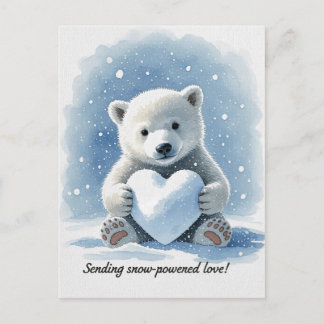 Cartão Postal Polar bear in the snow with heart shaped snowball
