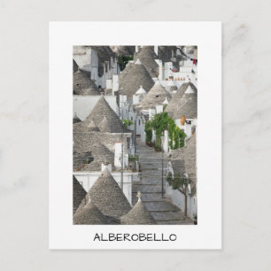 Cartão Postal Rua com casas trulli em Alberobello, Apúlia