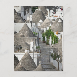 Cartão Postal Rua com casas trulli em Alberobello, Apúlia